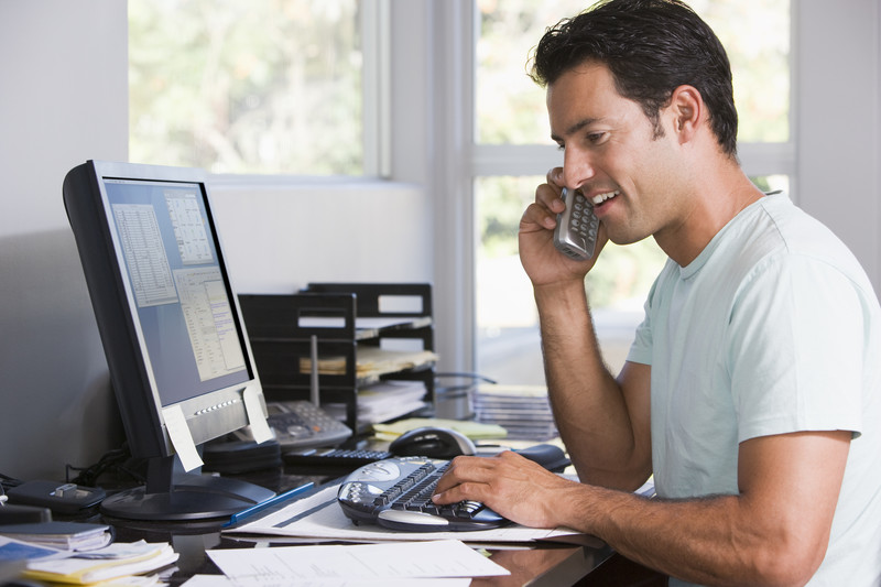 man on computer