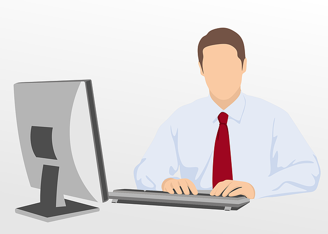 man on computer