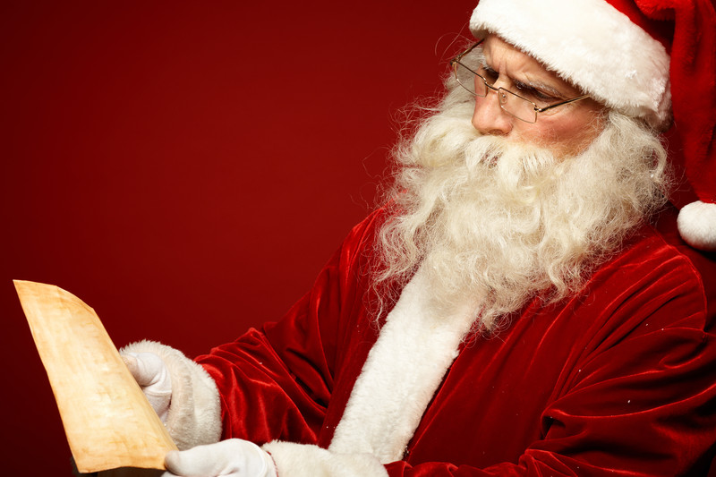 santa reading a letter from his landlord